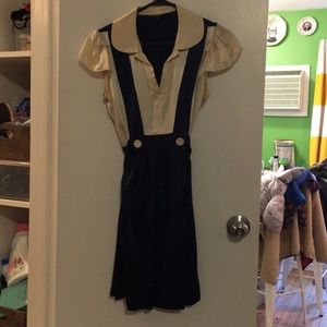 100% silk dress w peter pan collar, attached belt